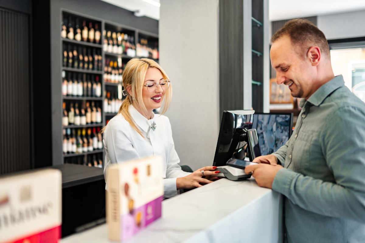 customer-paying-at-a-liquor-store-checkout