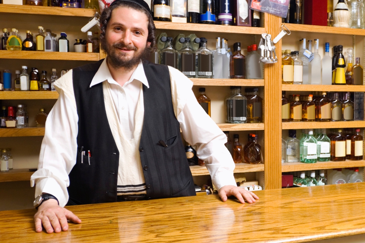 liquor-store-owner-behind-the-counter